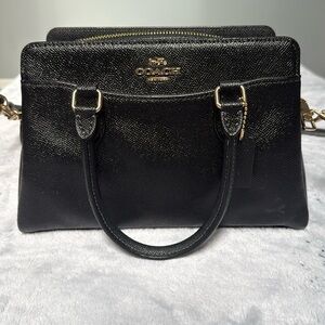 Black Leather Satchel with Gold Accents and Chain Strap